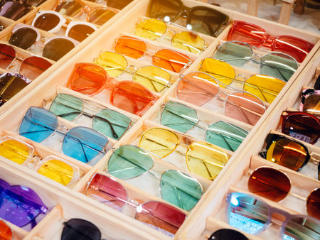 Colourful Sunglasses Fashion shopping display in wooden box Hipster Lifestyle