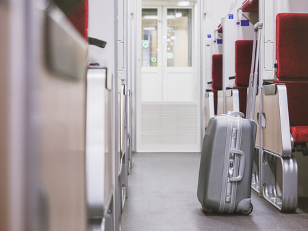Luggage in Train interior Train Travel conceptの写真素材