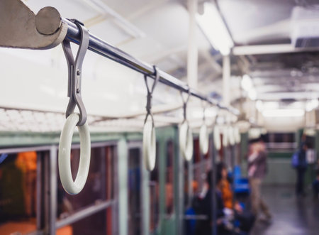 Handrails on tram safety Travel transportation with blur Peopleの写真素材