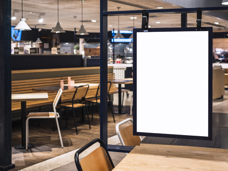 Mock up Poster frame template in Cafe table and seats interior Advertising bannerの写真素材