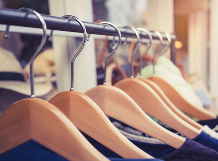 Clothing on Hangers Fashion retail Display Shop Business conceptの写真素材