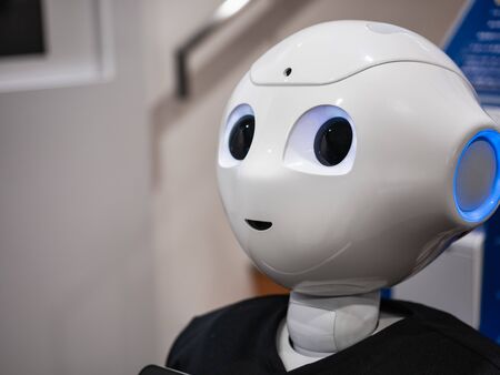 TOKYO, JAPAN - APR 14, 2019 : Pepper Robot Assistant at Soft bank shop Humanoid technology close up face portraitのeditorial素材