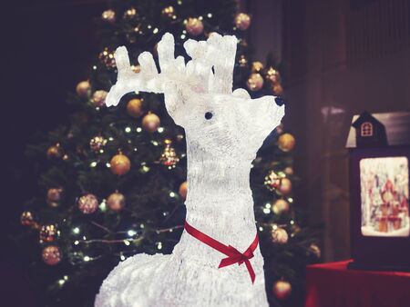 Christmas decoration Reindeer lighting with Xmas tree Festival holiday Backgroundの写真素材