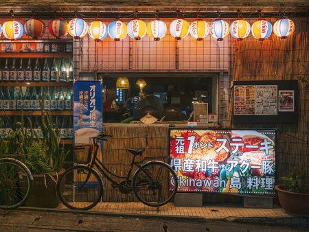 OKINAWA, JAPAN - SEP 2 2019 : Sake Bar restaurant Local Beer Orion Bar on Kokusai dori nightlife Okinawa Japanのeditorial素材