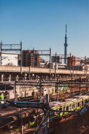 TOKYO, JAPAN - JAN 27, 2013 : Tokyo sky tree landmark building with train railway transportationのeditorial素材