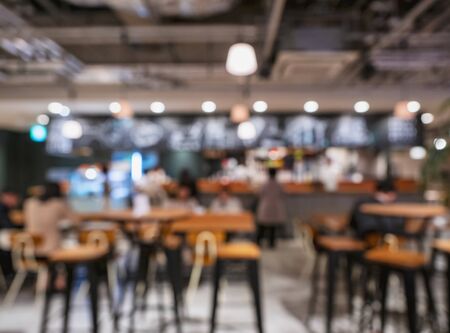 Cafe restaurant Interior table and seat with people Party Blur backgroundの写真素材