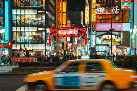 TOKYO, JAPAN - APR 12, 2019 : Kabuki-cho Colourful Neon lights, Shinjuku Famous street Crowd people Nightclub Bar Restaurant Tokyo Japan nightlifeのeditorial素材
