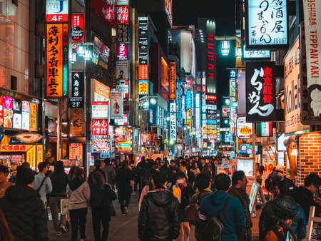 TOKYO, JAPAN - APR 12, 2019 : Kabuki-cho Colourful Neon lights, Shinjuku Famous street Crowd people Nightclub Bar Restaurant Tokyo Japan nightlifeのeditorial素材