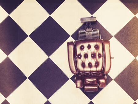 Barber seat retro style Leather chair top view Hair cut shop decorationの写真素材