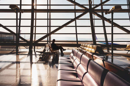 OSAKA, JAPAN - FEB 6, 2014 : Passenger sit in waiting area Departure gate Airport Terminal Airline flight Travel transportationのeditorial素材