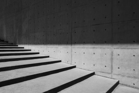 Architecture details Cement concrete wall stairs Modern building shade and shadow lightingの写真素材