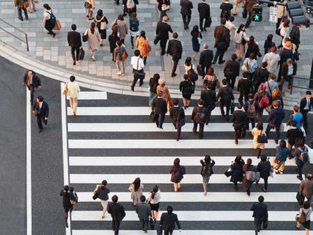 People walking on crosswalk Tokyo city street Japanese lifestyle TOKYO, JAPANのeditorial素材