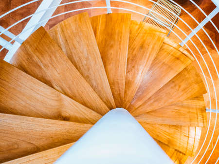 Spiral staircase Stair step wooden floor Interior modern building Architecture detailsの写真素材