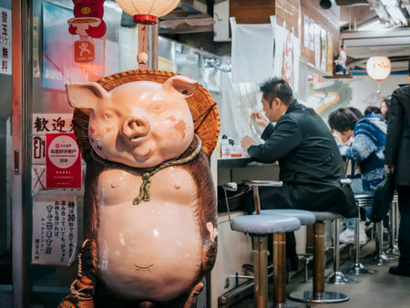 Man eating Ramen shop Tokyo street food Local ramen shop TOKYO, JAPAN - APR 12, 2019のeditorial素材