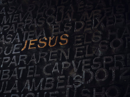 Jesus sign type on wall Black background Religion conceptの写真素材