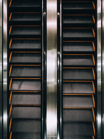 Escalators Up and Down move indoor Public buildingの写真素材