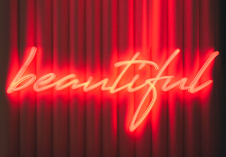 Beautiful Type font Neon sign light Signage on wallの写真素材