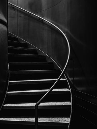 Staircase Black and white with a metal handrail Architecture detailsの写真素材