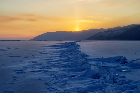Lake Baikal in winter at sunset. Ice hummocksの写真素材