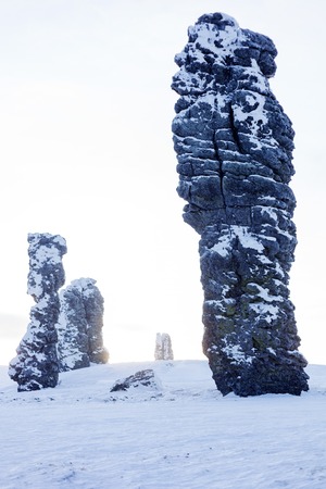 Weathering posts on the Manpupuner plateau, Komi Republic, Russia. Winter seasonの写真素材