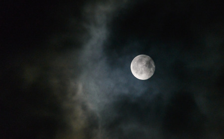 full moon in the clouds 7の写真素材