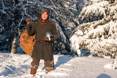 Silhouettes of two medieval warriorsの写真素材
