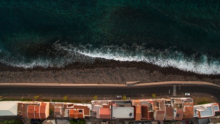Houses on the coast of the Atlantic Ocean aerial viewの写真素材