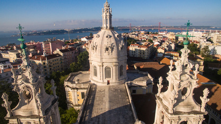 Dome of the Estrela Basilica on a background of Lisbon at morningの写真素材