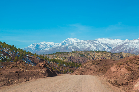 Dirt road in Atlas mountains of Moroccoの写真素材