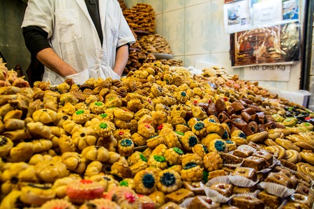 Seller of Arabic Desserts and sweets on the eastern market Marrakesh January 7, 2017 Maroccoのeditorial素材