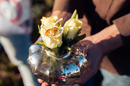 Wedding decoration Wedding rings on the flowersの写真素材