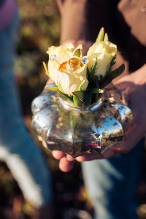 Wedding decoration Wedding rings on the flowersの写真素材