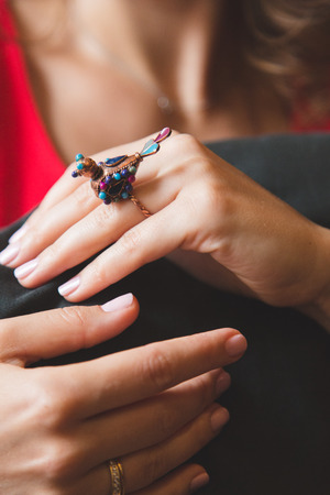 Vintage ring on the finger of a girl close-upの写真素材