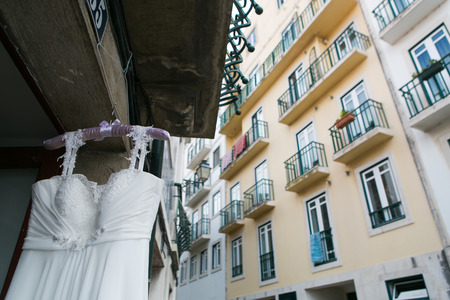 Wedding dress in the window of the Houseの写真素材