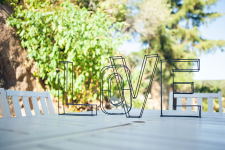 Wedding decoration: the word love on the table close-upの写真素材