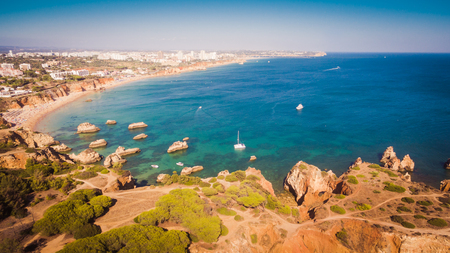 Aerial view of cliffs and beach Praia in Portimao, Algarve region, Portugalの写真素材