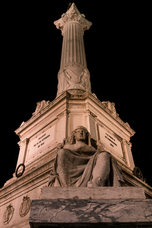 Column of Pedro IV on Rossio Square, Pedro IV Square, Praca de D. Pedro IV in the city of Lisbon at night, in Portugalの写真素材
