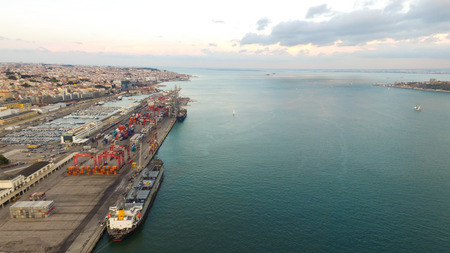 Lisbon Harbour, Porto de Lisboa aerial view at eveningの写真素材