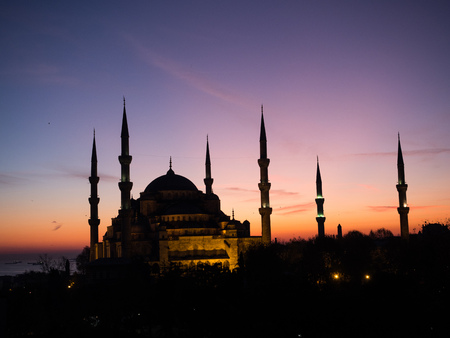 Silhouette of Blue mosque Sultan Ahmed on sunset background in Istanbul, Turkeyの写真素材