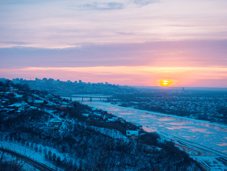 dramatic beautiful sunrise over the panorama of the city of Ufaの写真素材