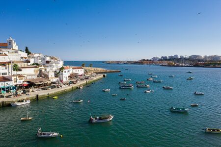 Ferragudo, Algarve, Portugal. Aerial wide drone viewの写真素材
