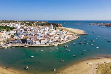 Ferragudo, Algarve, Portugal. Aerial wide drone viewの写真素材
