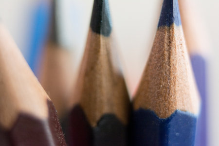 close up of color pencils on white background with shallow depth of fieldの写真素材