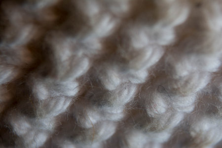 Macro detail of a knitted woolen texture. Abstract backgroundの写真素材