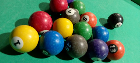 Billiard balls on green table. Top view. Close-up.の写真素材