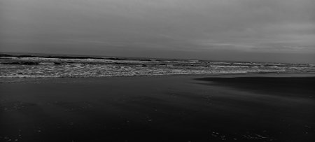 Black and white panorama of a beachの写真素材