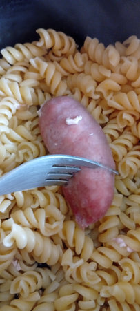 Fusilli Pasta with Sausage, Italian Food.の写真素材