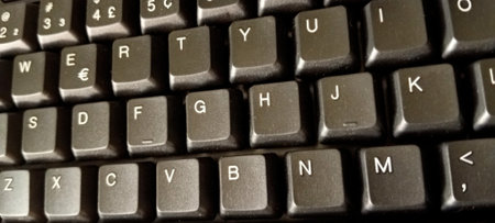 Close up of computer keyboard showing the keys spelling the word thank youの写真素材