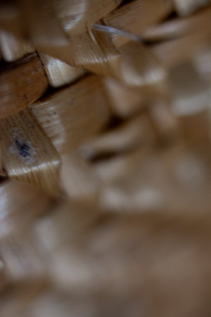 Close up of wicker basket. Selective focus and shallow depth of field.の写真素材