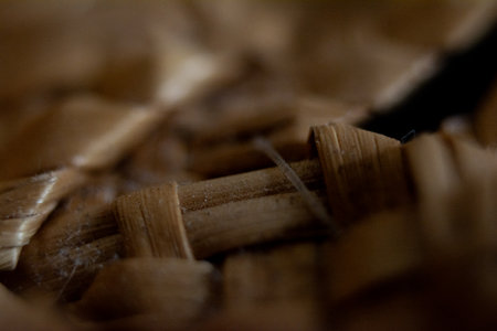 Close up of a basket made of twigs. Selective focus.の写真素材